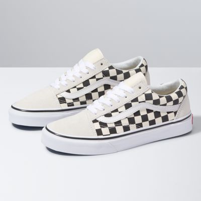 white checkerboard vans
