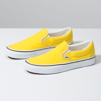 solid yellow slip on vans