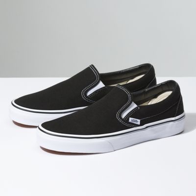 black and white van slip ons