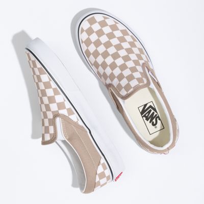 grey checkerboard slip on vans