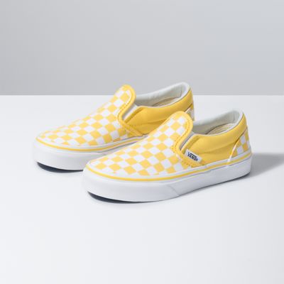 light yellow checkerboard slip on vans