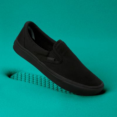 all black slip on vans