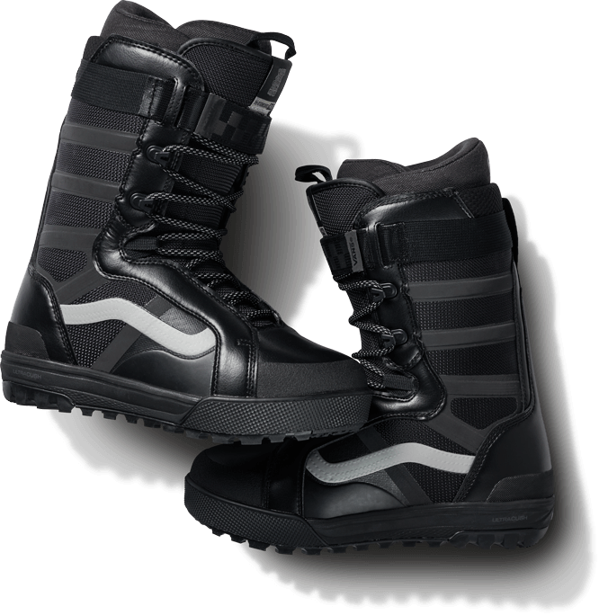 Pair of Cole Navin signature Hi Standard Pro boots with reflective glow.
