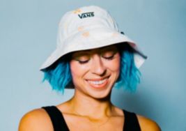 Lizzie Armanto wearing a Vans bucket hat.