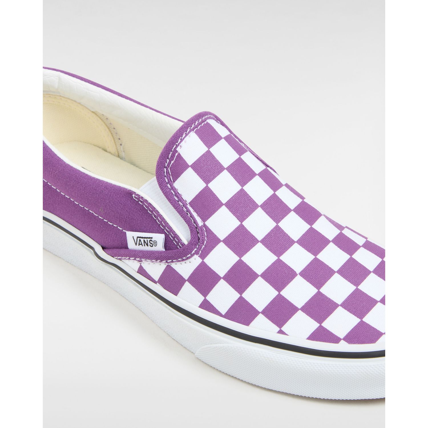 Purple checkered store vans slip on