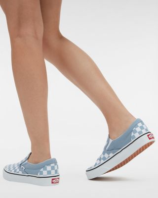 Blue vans store with checkered border