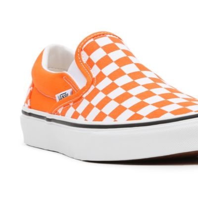 Orange checkerboard hot sale slip on vans