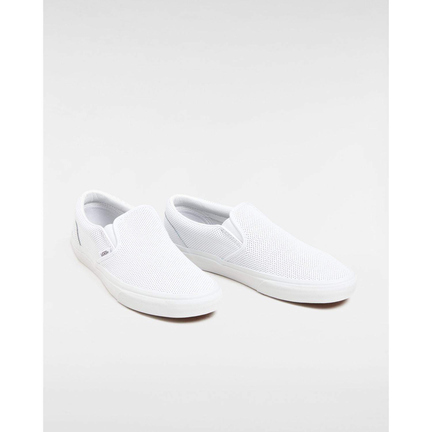 All white leather 2024 vans slip on