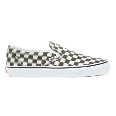 blurred checkered slip on vans