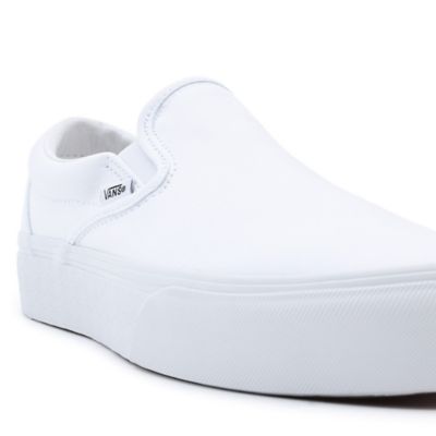 platform white slip on vans