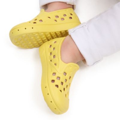 Kids yellow store slip on vans