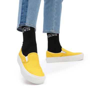 White platform best sale vans slip ons