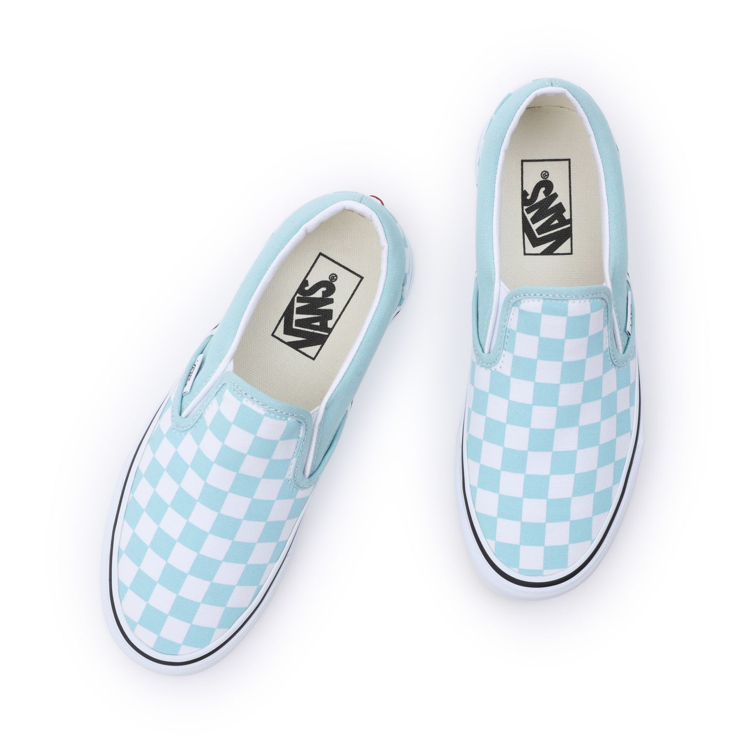 Pale blue shop slip on vans