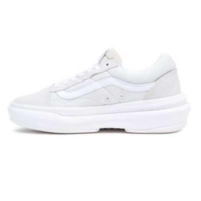 All white store vans tennis shoes